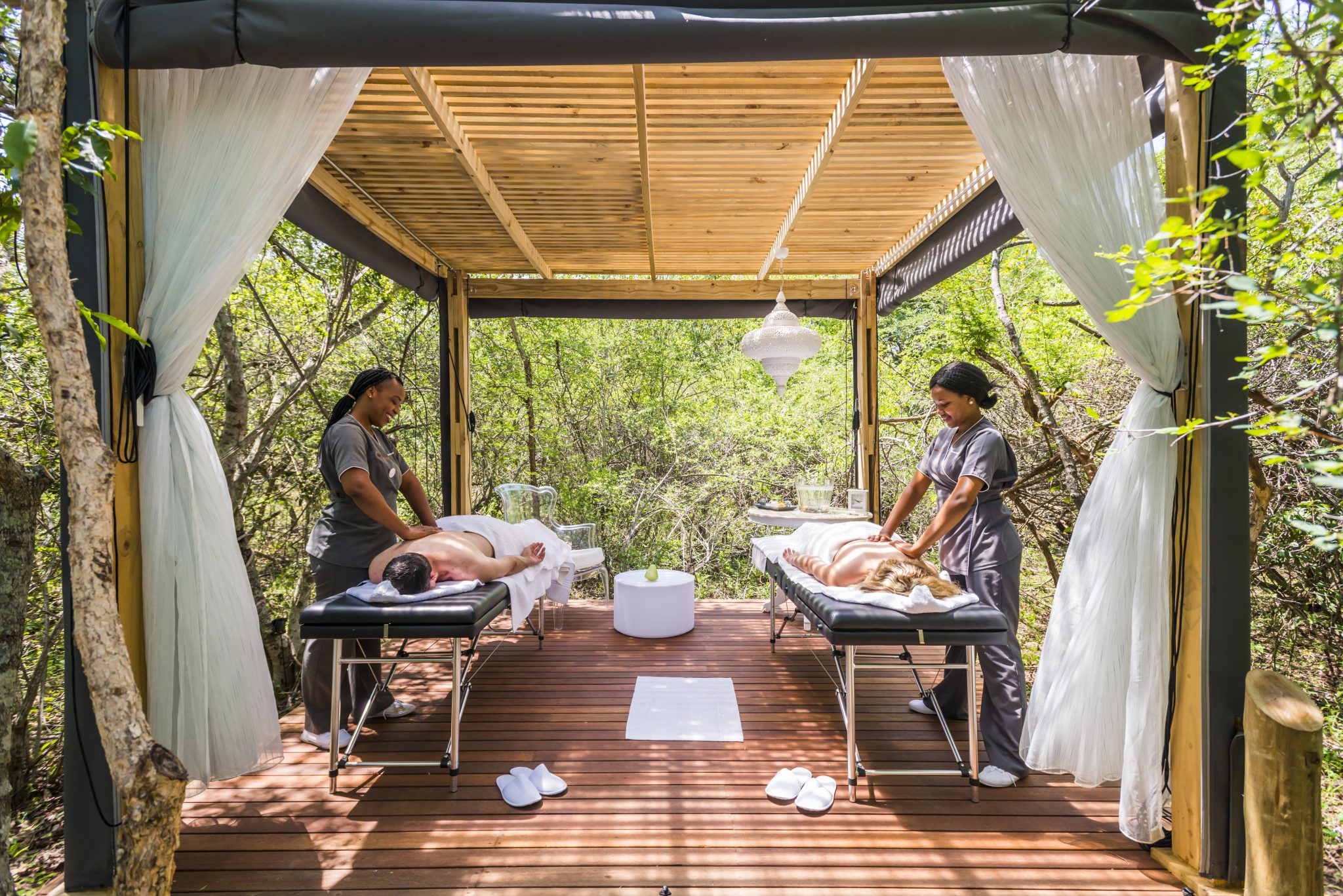 Outdoor spa treatment at AM Lodge